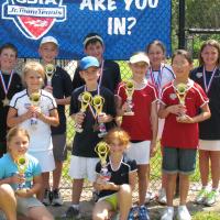 Tennis Center kids with trophies photo