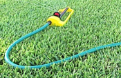image of a hose with sprinkler